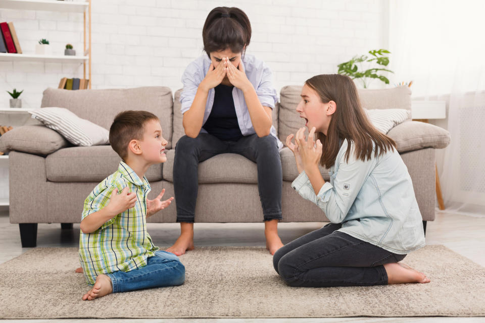 Help your kids manage conflict instead of solving it for them. (Photo: Getty)