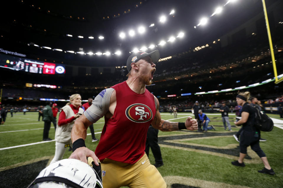 San Francisco 49ers tight end George Kittle celebrates after defeating the New Orleans Saints on a last second field goal, which was set up by his pass reception, after an NFL football game in New Orleans, Sunday, Dec. 8, 2019. The 49ers won 48-46. (AP Photo/Butch Dill)