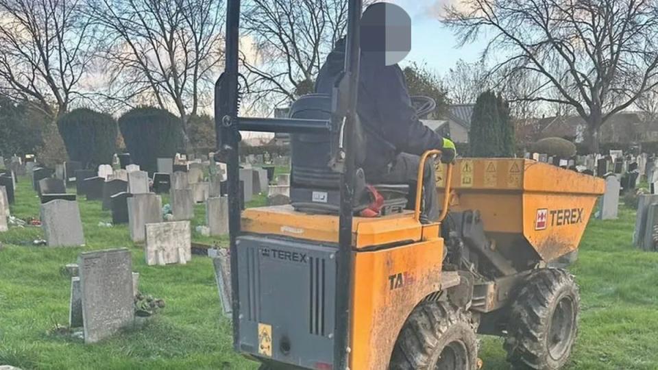 A mini-digger appearing to drive over the graves of people buried at the Gloucestershire cemetery (Alastair Chambers)