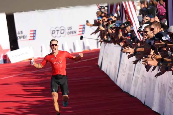 Collin Chartier cheers as he approaches the finish line of the PTO US Open