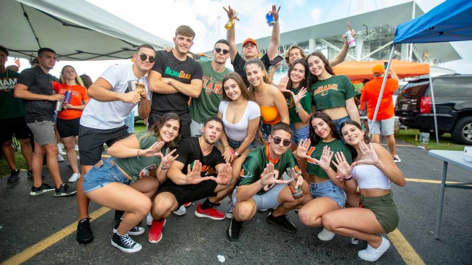Crowds of Miami Hurricanes fans tailgate in preperation for the game against Virginia Tech outside Hard Rock Stadium in Miami Gardens on Saturday, October 5, 2019.