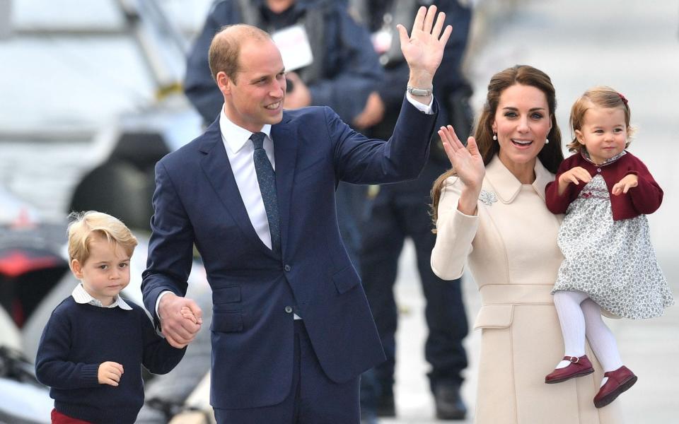 Prince George with his sister Princess Charlotte, and the Duke and Duchess of Cambridge