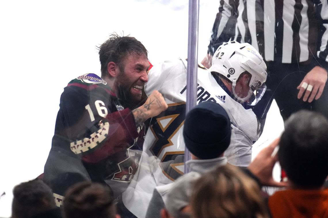 Jan 2, 2024; Tempe, Arizona, USA; Arizona Coyotes left wing Jason Zucker (16) fights Florida Panthers defenseman Gustav Forsling (42) during the second period at Mullett Arena.