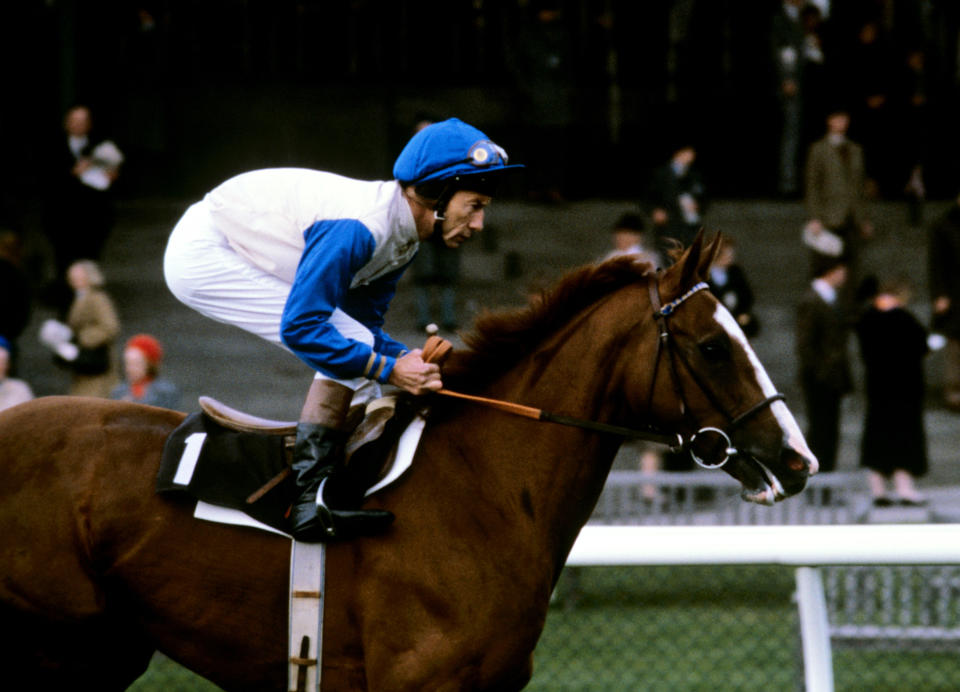 Lester Piggott riding 'Free Guest', goes to the post for the last time as a jockey before he retires, at Newbury racecourse for the start of the St. Simon Stakes. He finished second.   (Photo by PA Images via Getty Images)