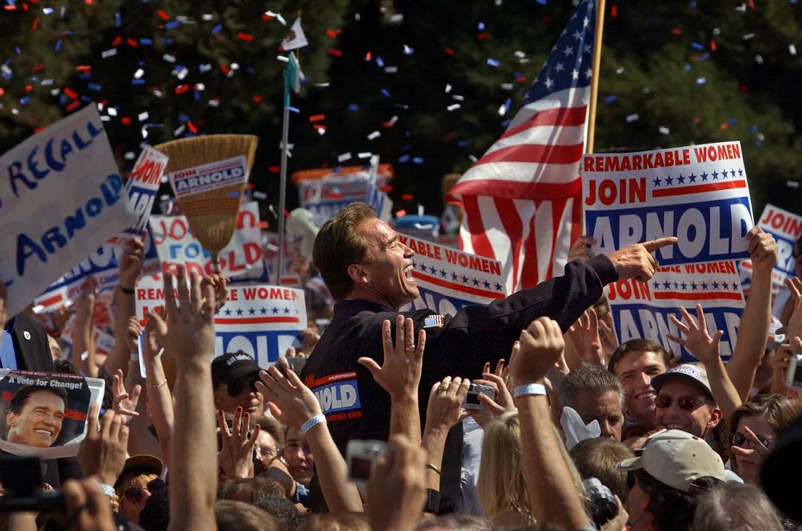 Republican gubernatorial candidate Arnold Schwarzenegger mingles with the crowd after speaking at a rally at the state Capitol on Oct. 5, 2003. RANDY PENCH/Sacramento Bee file