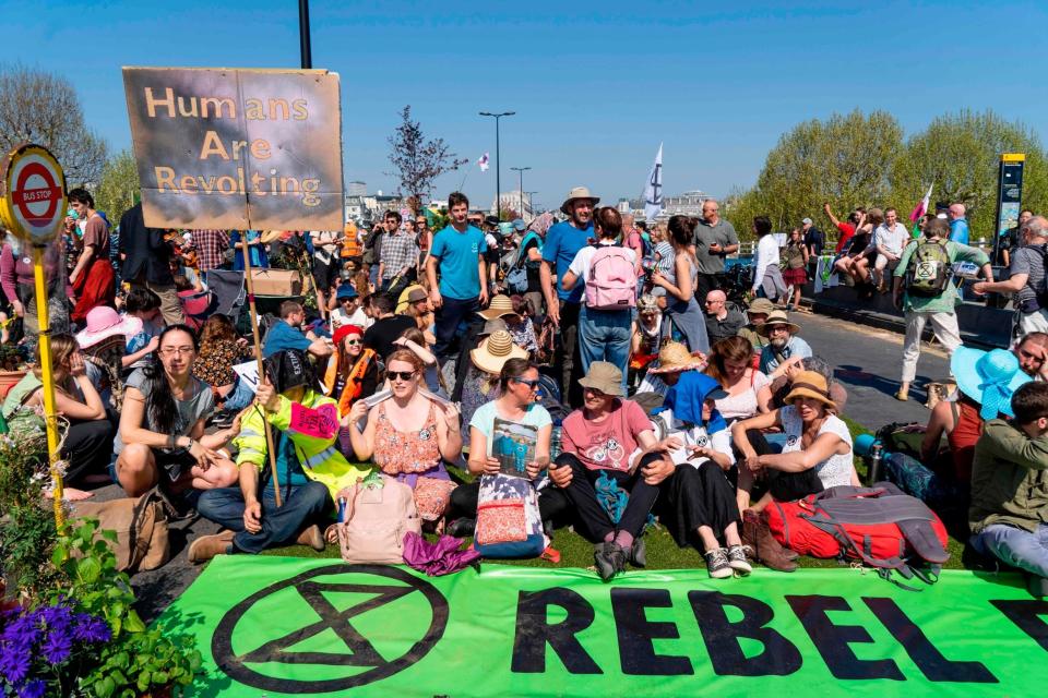 Climate change activists continued to block the road on Waterloo Bridge in London (AFP/Getty Images)