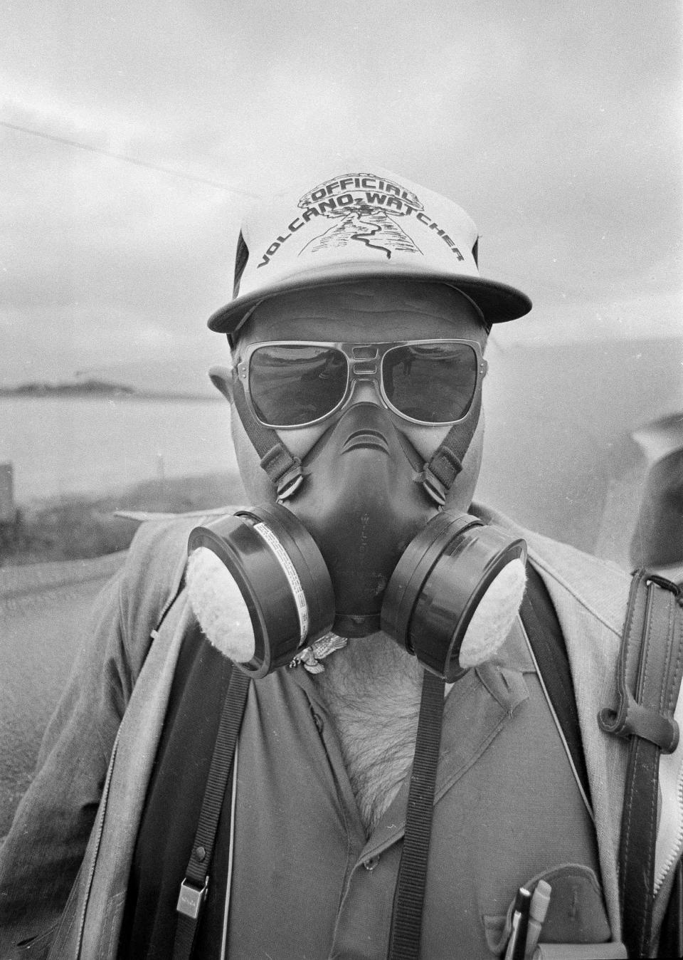 Jan Smith of Castle Rock, Wash., wears a gas mask after Mount St. Helens erupted filling the air with ash and smoke, May 29, 1980. Many areas of the northwest received varying amounts of ash after the May 18 eruption. 
