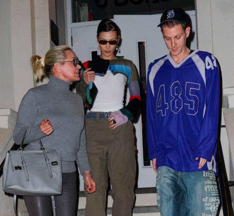 Yolanda Hadid, Bella Hadid and Marc Kalman leave Bond St. Sushi after dinner on March 21, 2022 in New York City