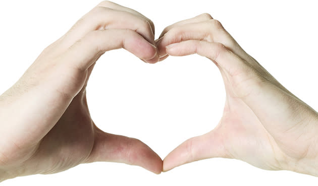 Hands make the symbol of a heart (Thinkstock)