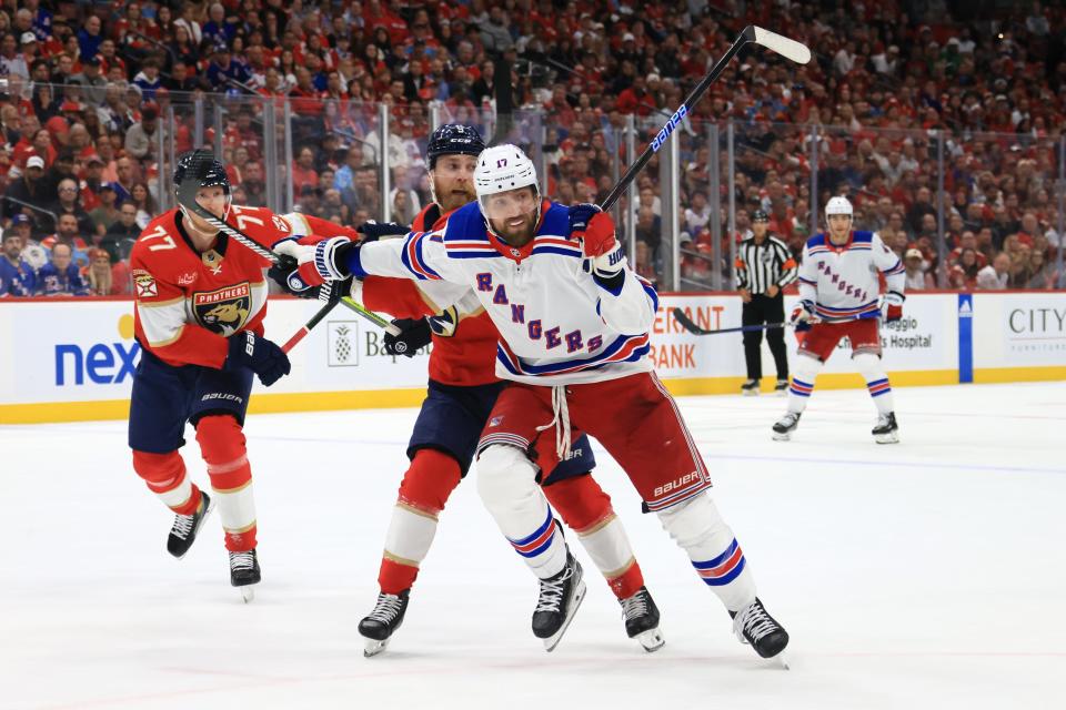 SUNRISE, FLORIDA - MAY 28: Blake Wheeler #17 of the New York Rangers is defended by Sam Bennett #9 of the Florida Panthers during the first period in Game Four of the Eastern Conference Final of the 2024 Stanley Cup Playoffs at Amerant Bank Arena on May 28, 2024 in Sunrise, Florida.