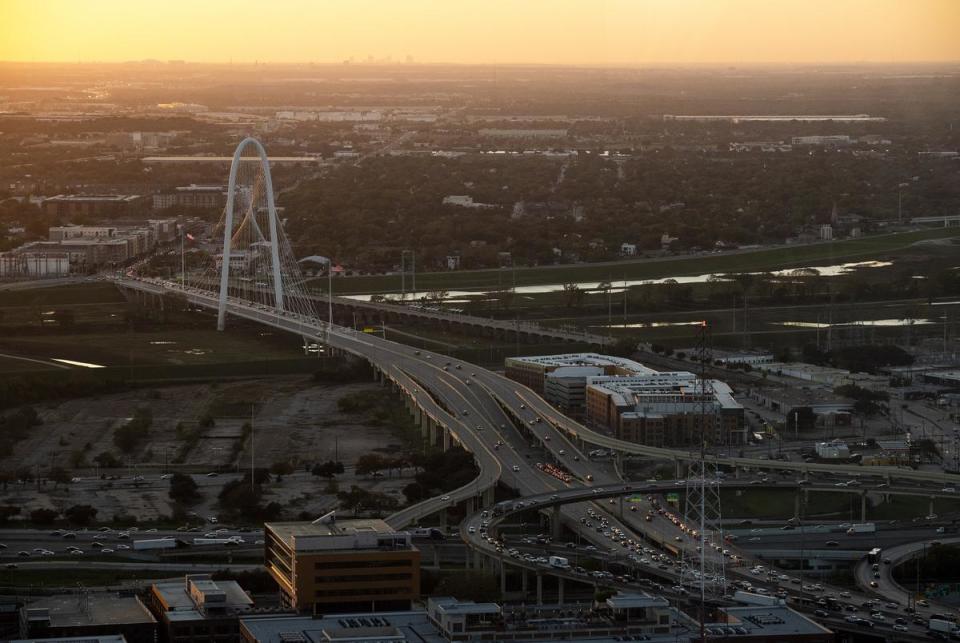 A view of the Margaret Hunt Hill Bridge from The Tower Club on the 48th floor of the Santander Tower in downtown Dallas, on Nov. 07, 2023. Texas metros have a glut of vacant offices space driven by the rise of remote work, overbuilding and other factors during the pandemic. One option companies are doing to combat the changes, is to convert office space into residential housing.