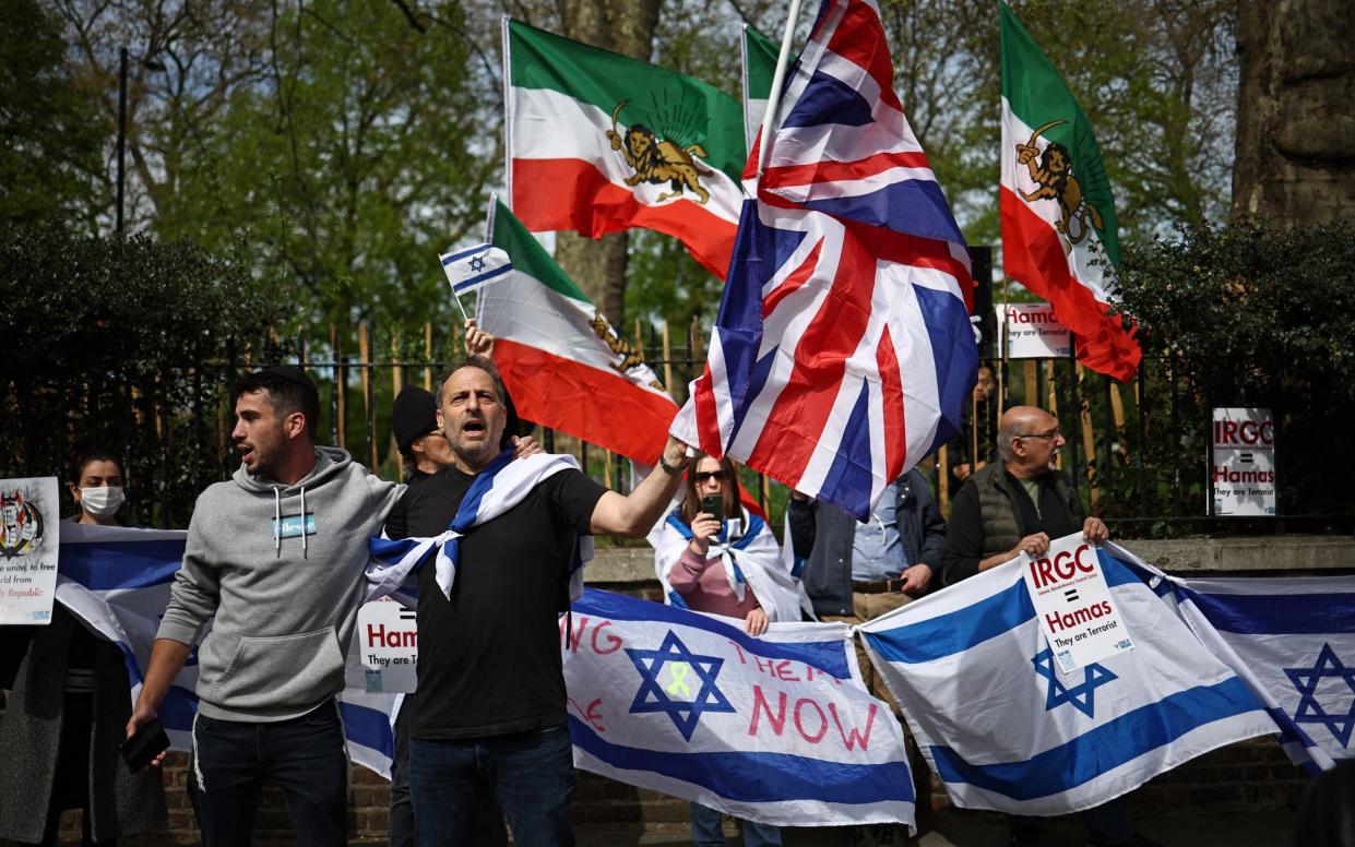 An anti-Iranian demonstration is held outside the Iranian Embassy in London on April 14