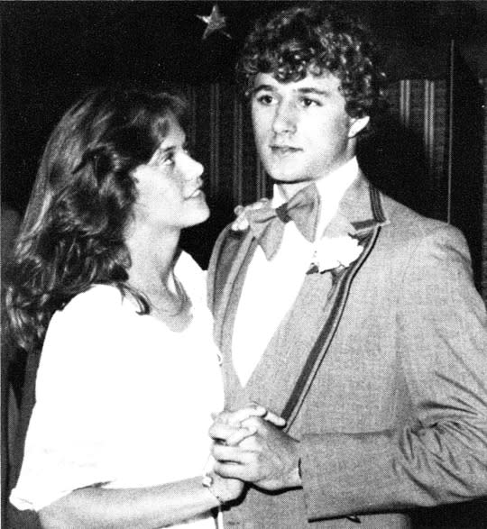 <p>Before she became rom-com royalty, Meg Ryan was just a regular teen sporting the feathered hair trend of the day at Bethel High School’s 1979 senior prom in Bethel, Conn. — where she was named prom queen. It looks like she was already practicing her dreamy-eyed, lovestruck expression for <em>Sleepless in Seattle</em> in this shot! (Photo: Seth Poppel/Yearbook Library) </p>