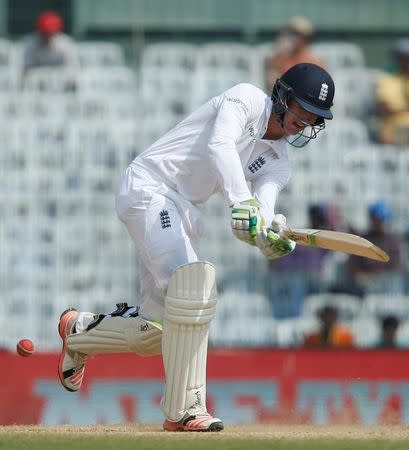 Cricket - India v England - Fifth Test cricket match - M A Chidambaram Stadium, Chennai - 20/12/16. England's Keaton Jennings plays a shot as India's players look on. REUTERS/Danish Siddiqui