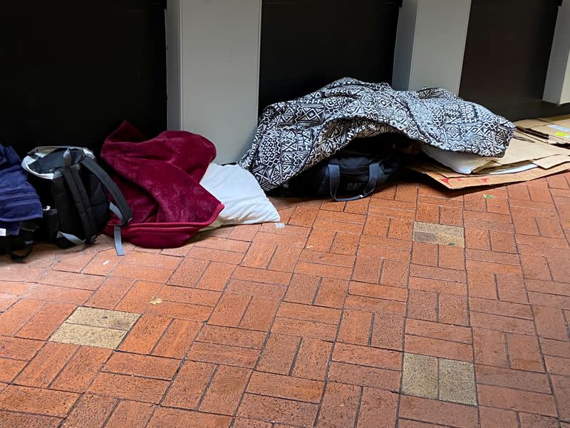 A view of personal items of a homeless person living on the sides of busy streets in Wellington