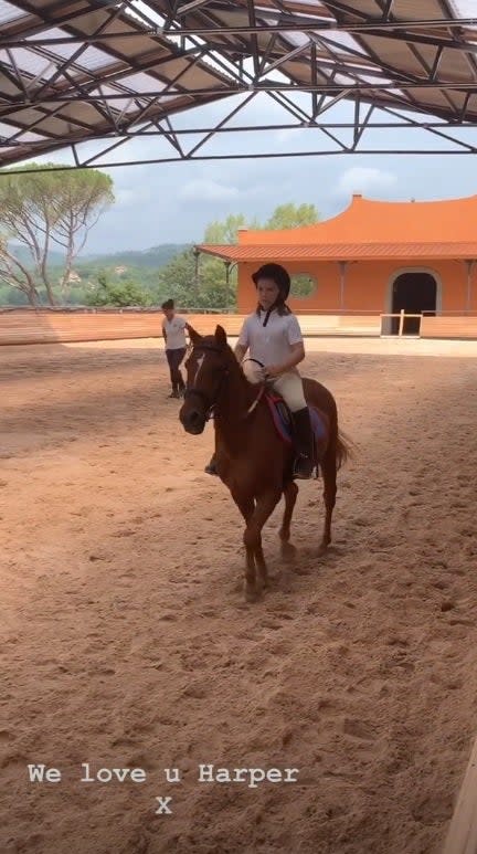 Harper Beckham is seen horse riding while on holiday in Italy with her family (@VictoriaBeckham)