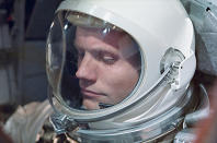 Neil Armstrong, seen here aboard Gemini 8, was the first U.S. civilian to fly into orbit. Armstrong had retired from the U.S. Navy in 1960. This photo was relatively rarely-seen until it was used as the cover of Armstrong's authorized biography