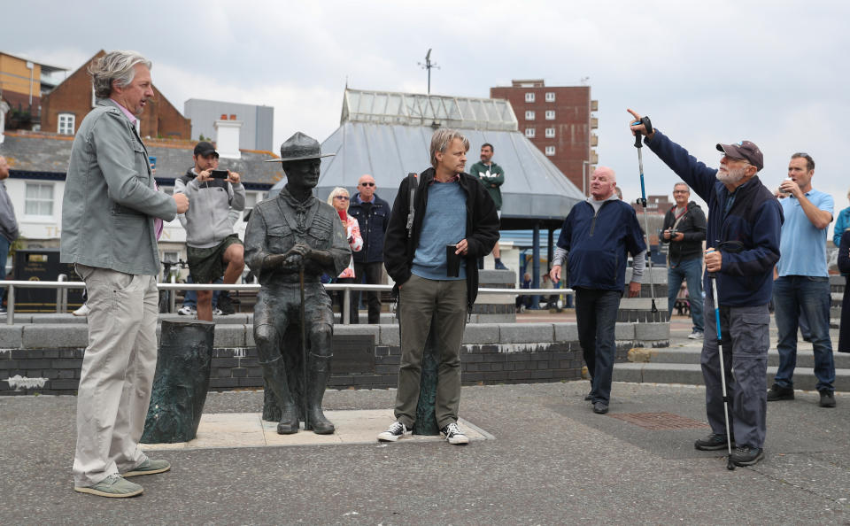 Local residents show their support for a statue of Robert Baden-Powell on Poole Quay in Dorset ahead of its expected removal to "safe storage" following concerns about his actions while in the military and "Nazi sympathies". The action follows a raft of Black Lives Matter protests across the UK, sparked by the death of George Floyd, who was killed on May 25 while in police custody in the US city of Minneapolis.