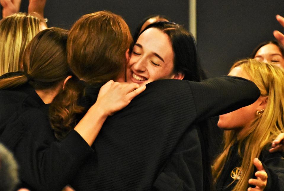 Missouri volleyball's Jordan Iliff hugs head coach Dawn Sullivan after getting selected into the 2023 NCAA Tournament during a NCAA Tournament Selection Show watch party in the Columns Club at Faurot Field on Nov. 26, 2023, in Columbia, Mo.