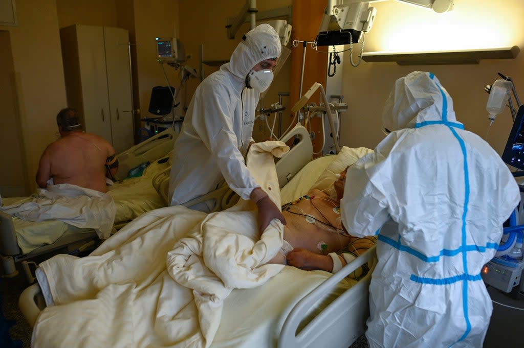 Doctors in Sofia attend to a Covid-19 patient in intensive care  (AFP via Getty)