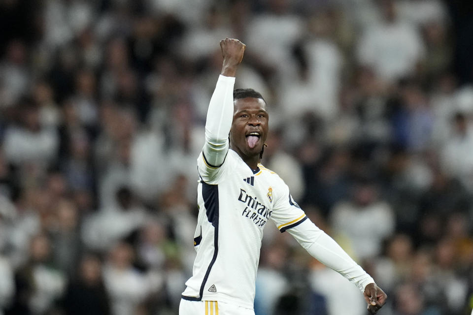 Real Madrid's Eduardo Camavinga celebrates scoring his side's first goal during the Champions League quarterfinal first leg soccer match between Real Madrid and Manchester City at the Santiago Bernabeu stadium in Madrid, Spain, Tuesday, April 9, 2024. (AP Photo/Manu Fernandez)