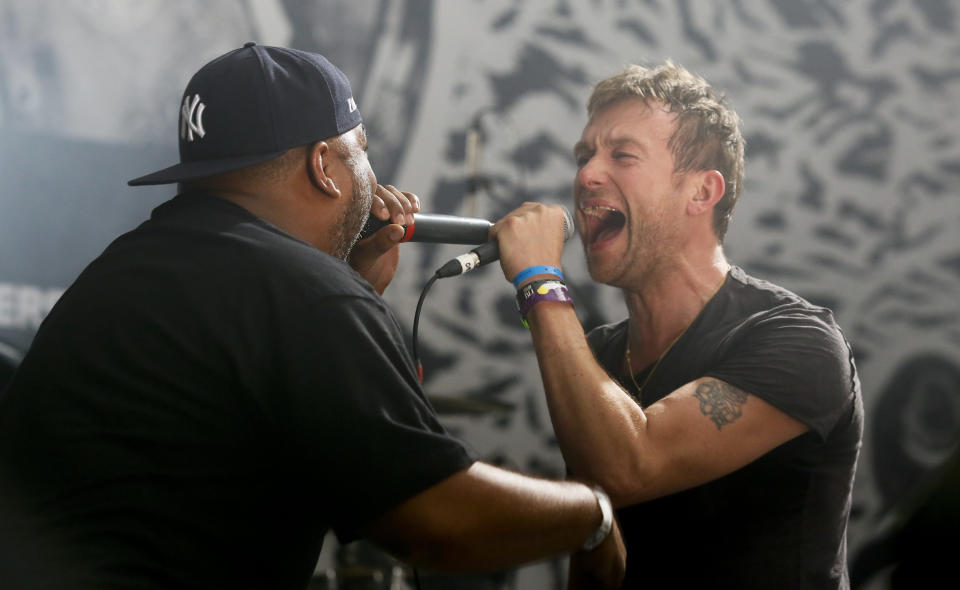 Damon Albarn, right, is joined by De La Soul's Vincent Mason while performing during the SXSW Music Festival Friday March 14, 2014, in Austin, Texas. (Photo by Jack Plunkett/Invision/AP)