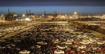 Mercedes cars are pictured at a shipping terminal in the harbour of the German northern town of Bremerhaven, in this March 8, 2012 file picture. In recent weeks, the economy that proud German politicians have taken to describing as a "growth locomotive" and "stability anchor" for Europe, has been hit by a barrage of bad news that has surprised even the most ardent Germany sceptics. The big shocker came on August 14, 2014, when the Federal Statistics Office revealed that gross domestic product (GDP) had contracted by 0.2 percent in the second quarter. Picture taken March 8, 2012. TO MATCH STORY GERMANY-ECONOMY/ REUTERS/Fabian Bimmer/Files (GERMANY - Tags: TRANSPORT BUSINESS)
