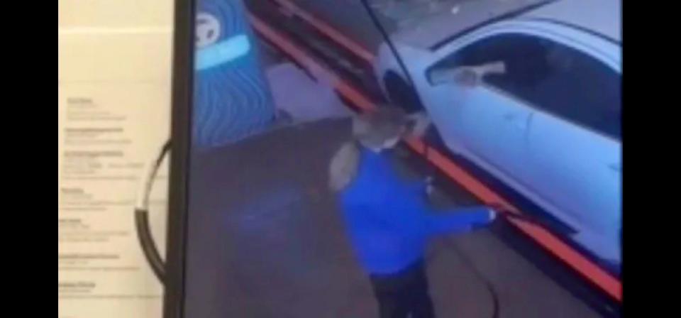 Indiana car wash worker Anna Harycki, 18, is seen in a viral video retaliating with her spray hose after she was splashed by lemonade tossed by a rude customer through her open window.