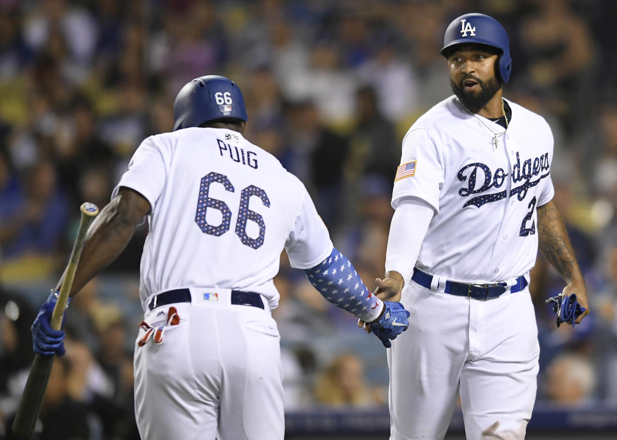 The Los Angeles Dodgers have traded Yasiel Puig, Matt Kemp and Alex Wood to the Cincinnati Reds. (Getty Images)