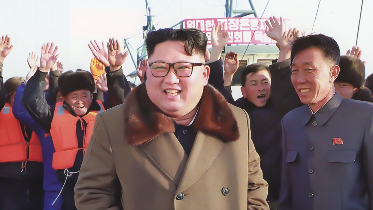 Kim Jong-Un smiling