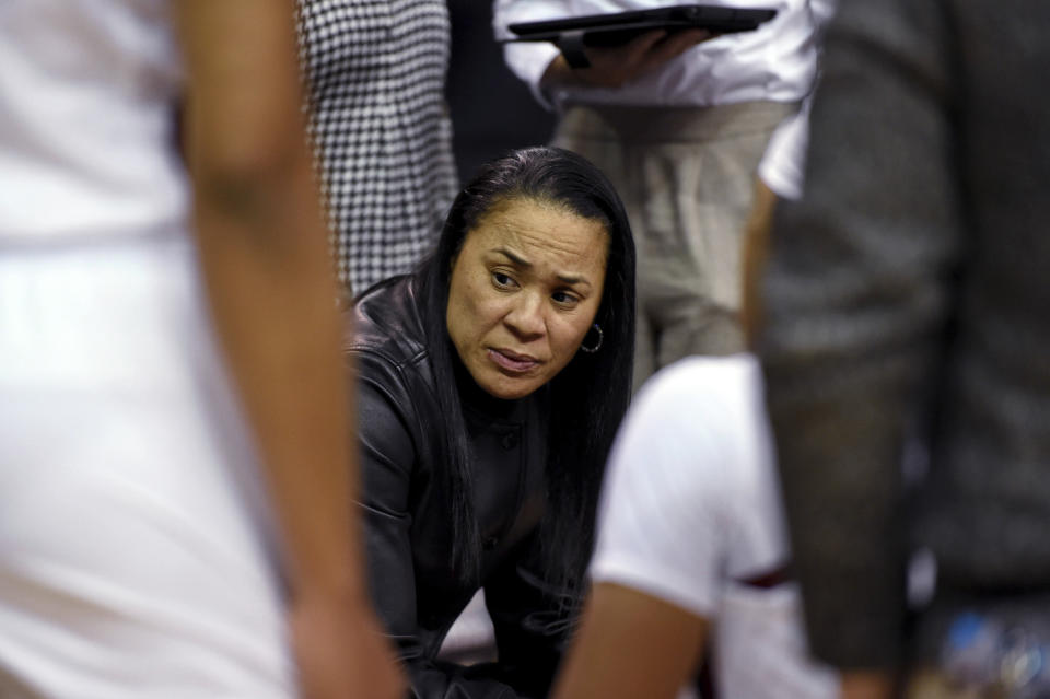 South Carolina coach Dawn Staley speaks to players during the first half of an NCAA college basketball game against South Carolina-Upstate on Thursday, Nov. 21, 2019, in Columbia, S.C. (AP Photo/Richard Shiro)