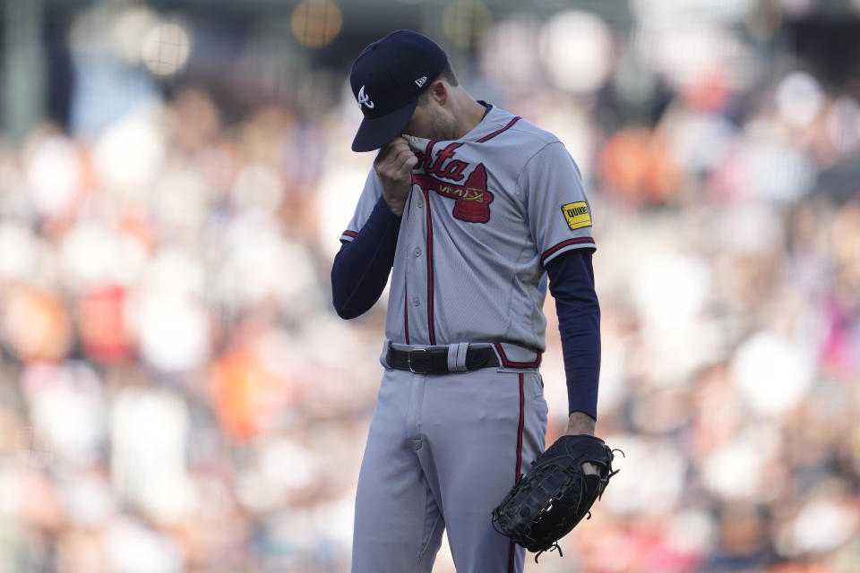 Atlanta Braves pitcher Collin McHugh reacts after walking San Francisco Giants' J.D. Davis with the bases loaded to score Luis Matos during the fifth inning of a baseball game in San Francisco, Sunday, Aug. 27, 2023. (AP Photo/Jeff Chiu)