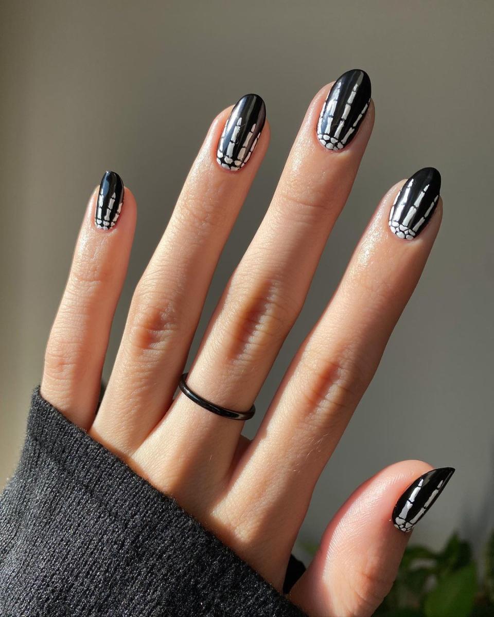 This skeleton mani may be creepy, but it's so cool.