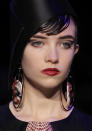 <b>Armani Prive SS13</b><br><br>Models wore a moody palette of bold red lips and dark tresses.<br><br> ©Reuters