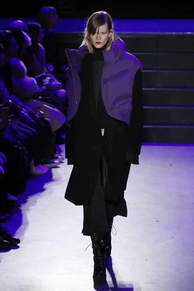 For a more discreet look, try adding touches of ultra violet to an outfit à la Masha Ma, which breaks up this all-black look with a purple padded gilet. Paris, March 4, 2018