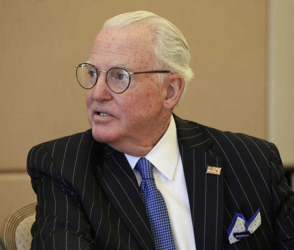 FILE - In this July 31, 2015 file photo, Chicago Alderman Ed Burke chairs a meeting of the City Council's finance committee in Chicago. The Chicago Tribune says federal agents executed search warrants at the City Hall office of the powerful Chicago alderman. An unidentified law enforcement source told the Tribune agents arrive at Ed Burke's aldermanic office Thursday Nov. 29, 2018 morning, told staff to leave and pulled brown paper across its glass doors blocking the view. (AP Photo/M. Spencer Green File)