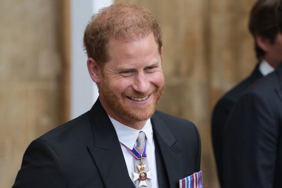 Prince Harry leaving after his father's coronation 