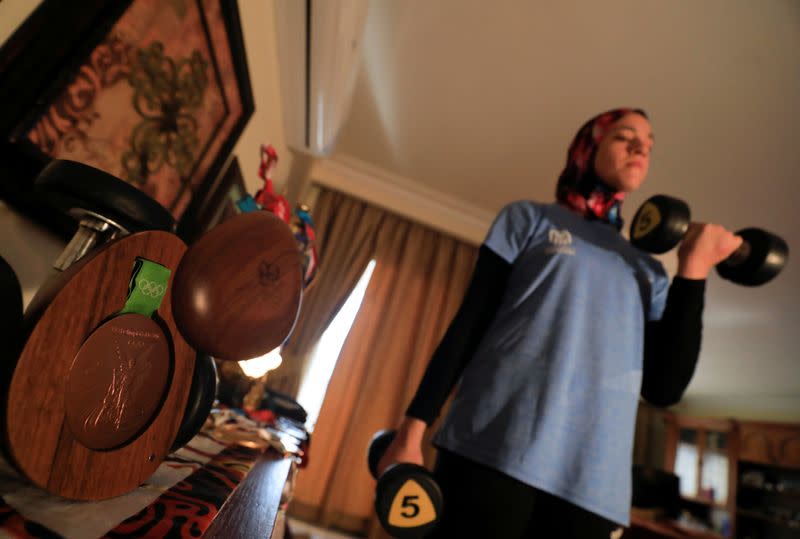 Egyptian Taekwondo practitioner and 2016 Rio Olympics bronze medallist Wahba works out at her home amidst the spread of the coronavirus disease (COVID-19) in Cairo