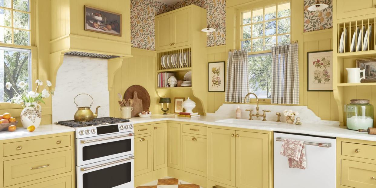 yellow british inspired farmhouse kitchen