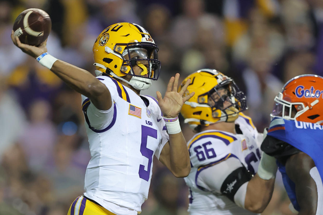 Jayden Daniels is one of many offensive players who should be selected in the first round of the NFL Draft. (Photo by Jonathan Bachman/Getty Images)