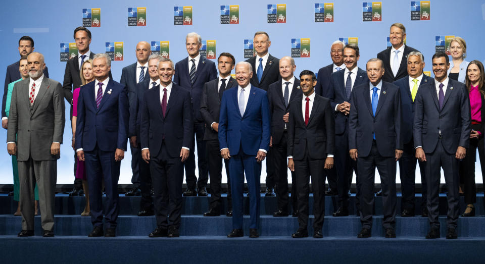 Joe Biden, center, during a family photo with Heads of State at the NATO Summit in Vilnius, Lithuania (Doug Mills / AP)