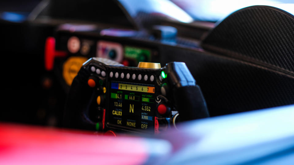 The steering wheel of the Revolution A-One race car.