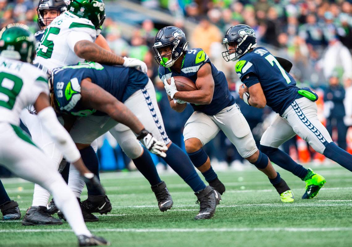 Seattle Seahawks running back Kenneth Walker III (9) runs with the ball in the first quarter of an NFL game at Lumen Field in Seattle Wash. on Jan. 1, 2023.