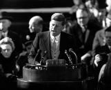 U.S. President John F. Kennedy delivers his inaugural address after taking the oath of office at Capitol Hill in Washington, D.C. on Jan. 20, 1961. Kennedy said, "We shall pay any price, bear any burden, meet any hardship, support any friend, oppose any foe, to assure the survival and success of liberty." Kennedy was sworn in as the 35th president of the United States. (AP Photo)