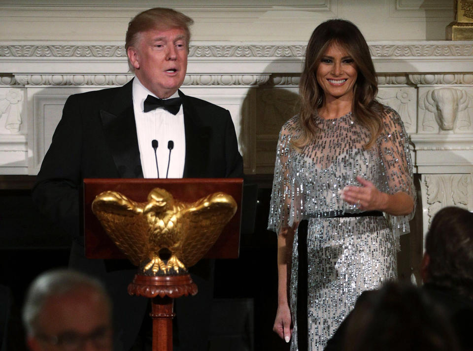 President Trump and first lady Melania Trump address their guests at the White House Thursday. (Photo by Alex Wong/Getty Images)