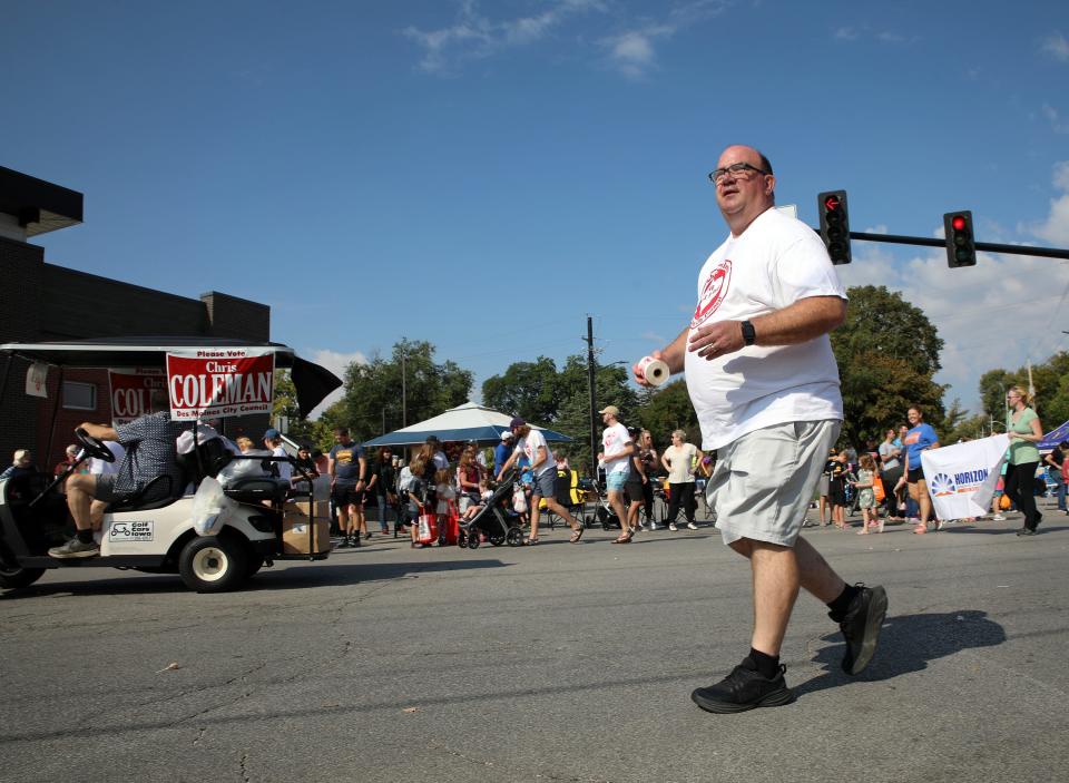 Des Moines City Council candidate Chris Coleman is seen during the Beaverdale Fall Festival Parade Saturday, Sept. 16, 2023 on Beaver Ave. in Des Moines.