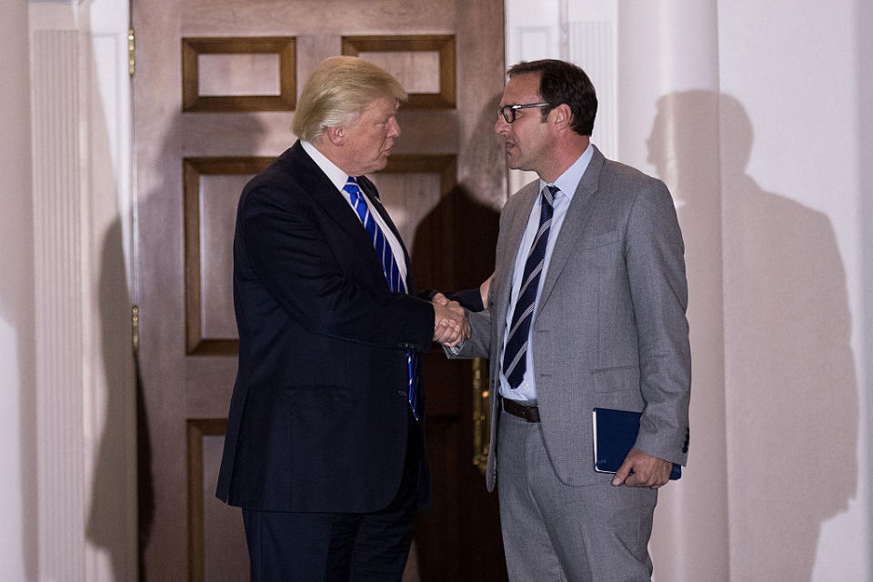 Donald Trump greets Cubs co-owner Todd Ricketts after a 2016 meeting at Trump International Golf Club. (Getty Images)