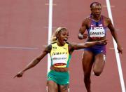 Foto del sábado de la jamaicana Elaine Thompson-Herah celebrando tras ganar la final de los 100 metros planos
