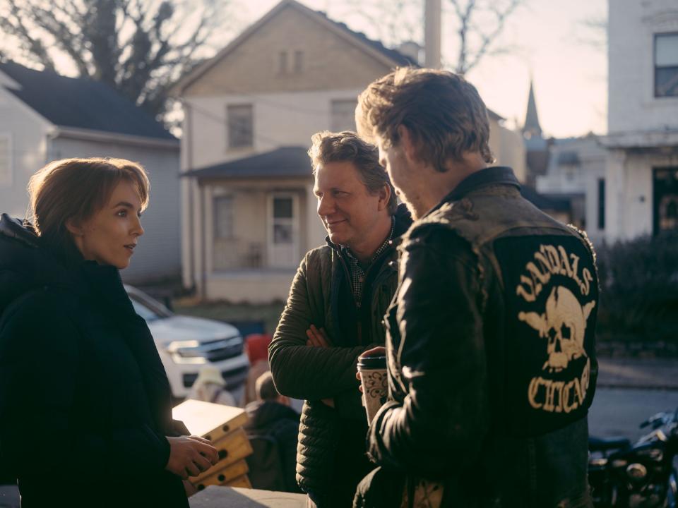 Jodie Comer as Kathy, Director Jeff Nichols, and Austin Butler as Benny on the set of "The Bikeriders."