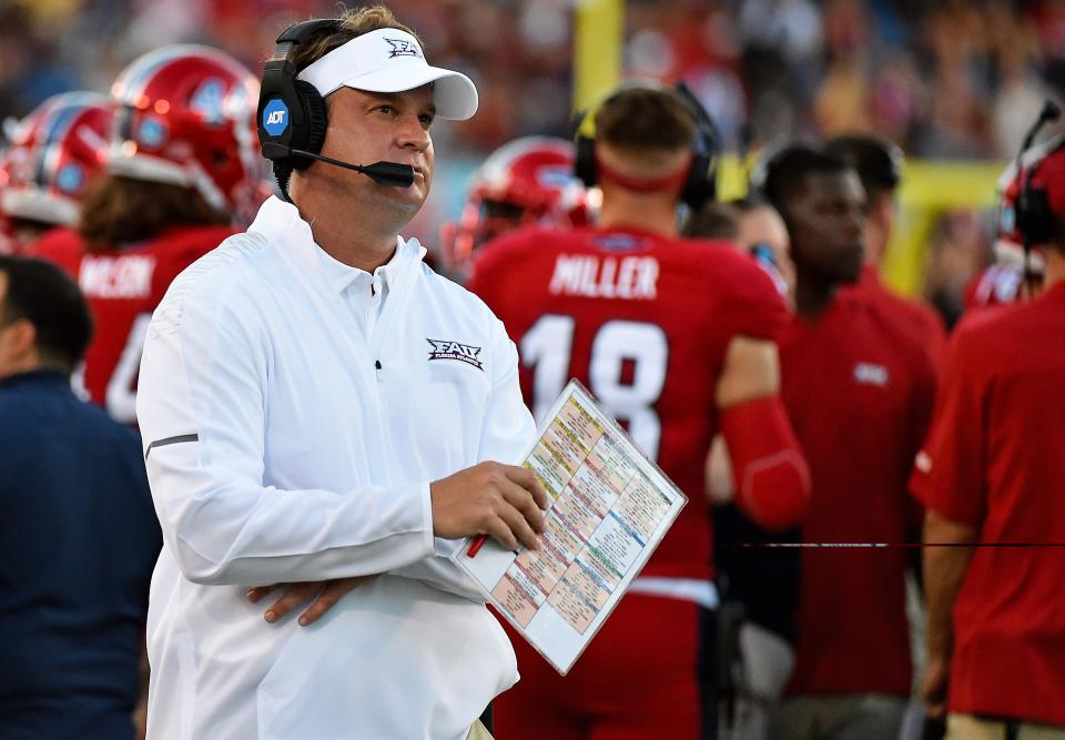 Florida Atlantic coach Lane Kiffin watches his team during the first half against Bethune Cookman at FAU Football Stadium.